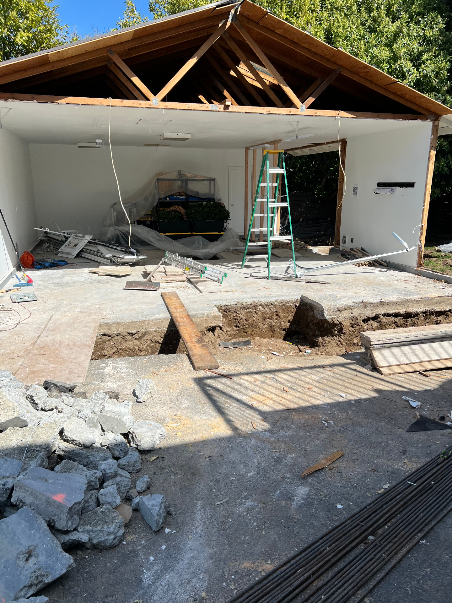 Interior view of a garage cleared out for renovation
