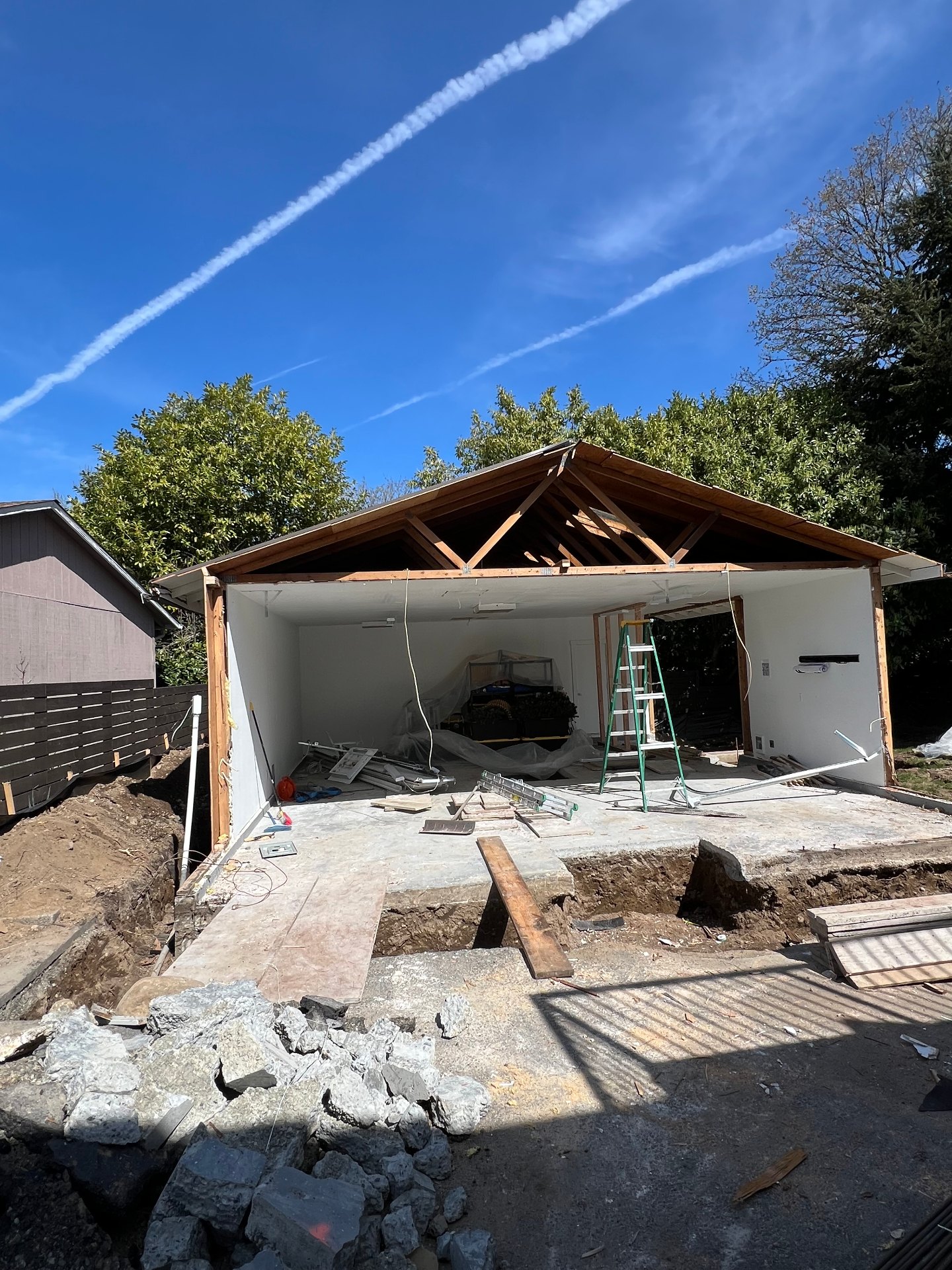Framed garage structure exposed after siding removal